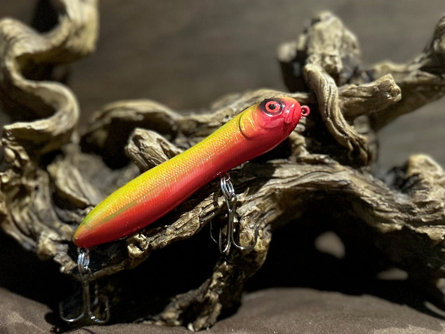 Custom airbrushed 4.0-inch peanut style topwater lure in Friction Blister
