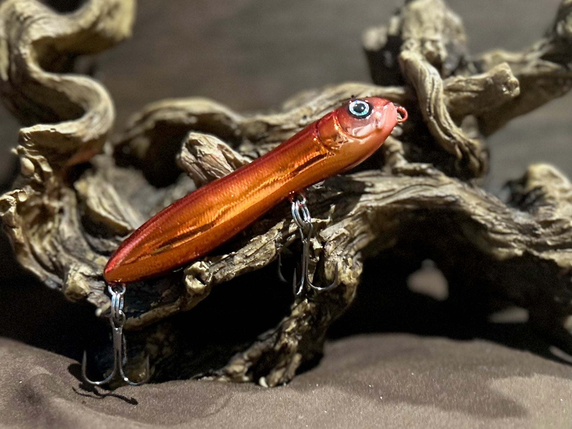 Custom airbrushed 4.0-inch peanut style topwater lure in Grip and Rip It