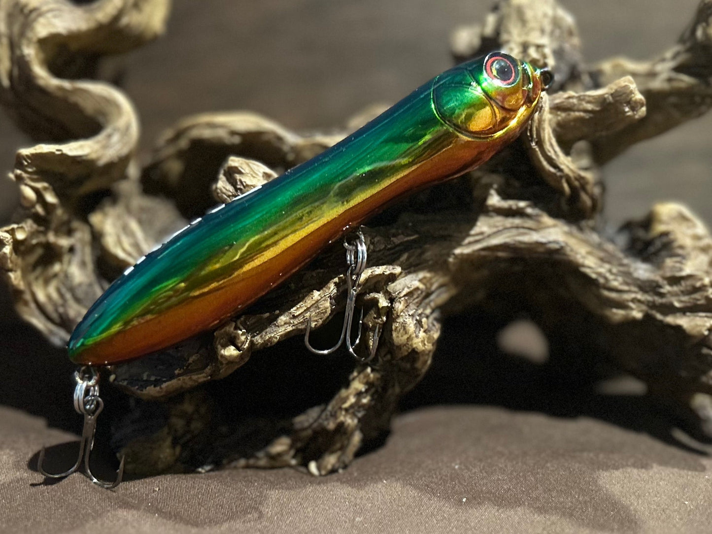 Custom airbrushed 5.25-inch peanut style topwater lure in Load Launcher