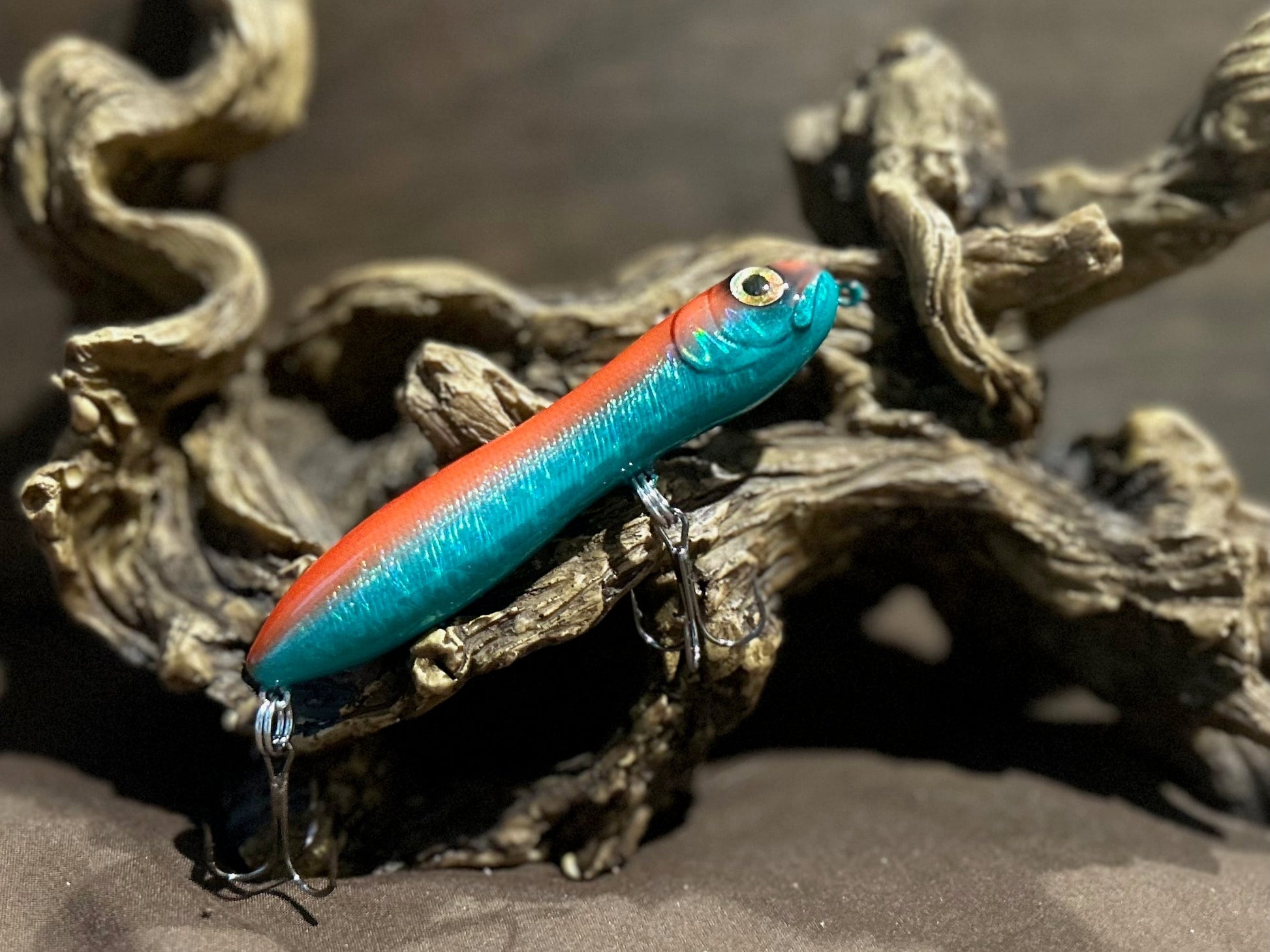 Custom airbrushed 4.0-inch peanut style topwater lure in Moist Minnow