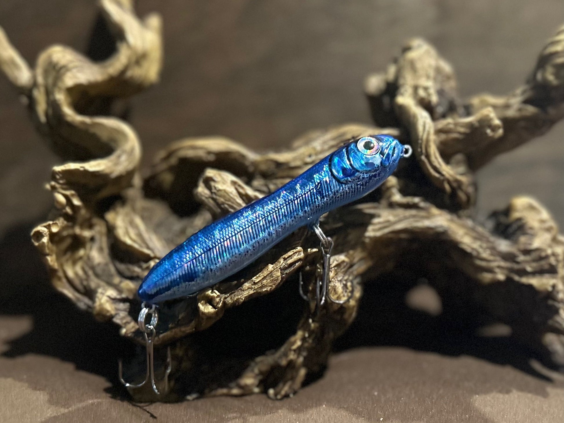Custom airbrushed 4.0-inch peanut style topwater lure in Polished Tool