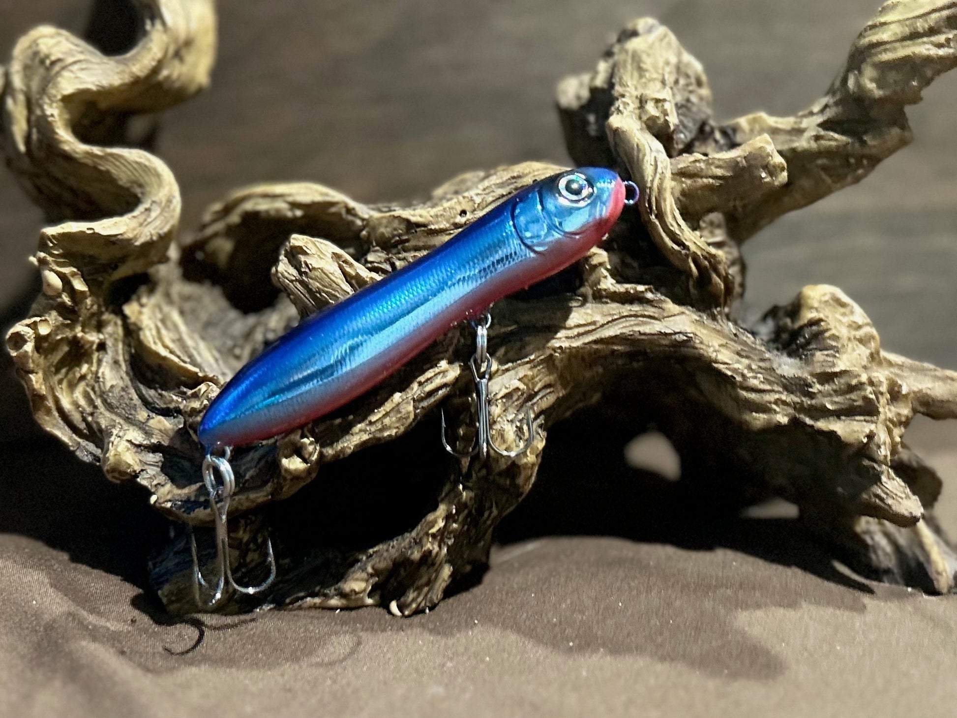 Custom airbrushed 4.0-inch peanut style topwater lure in Yank and Spank Special